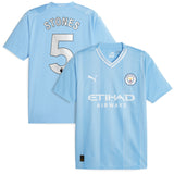 Manchester City Puma Home Shirt 2023-24 with Stones 5 printing - Kit Captain